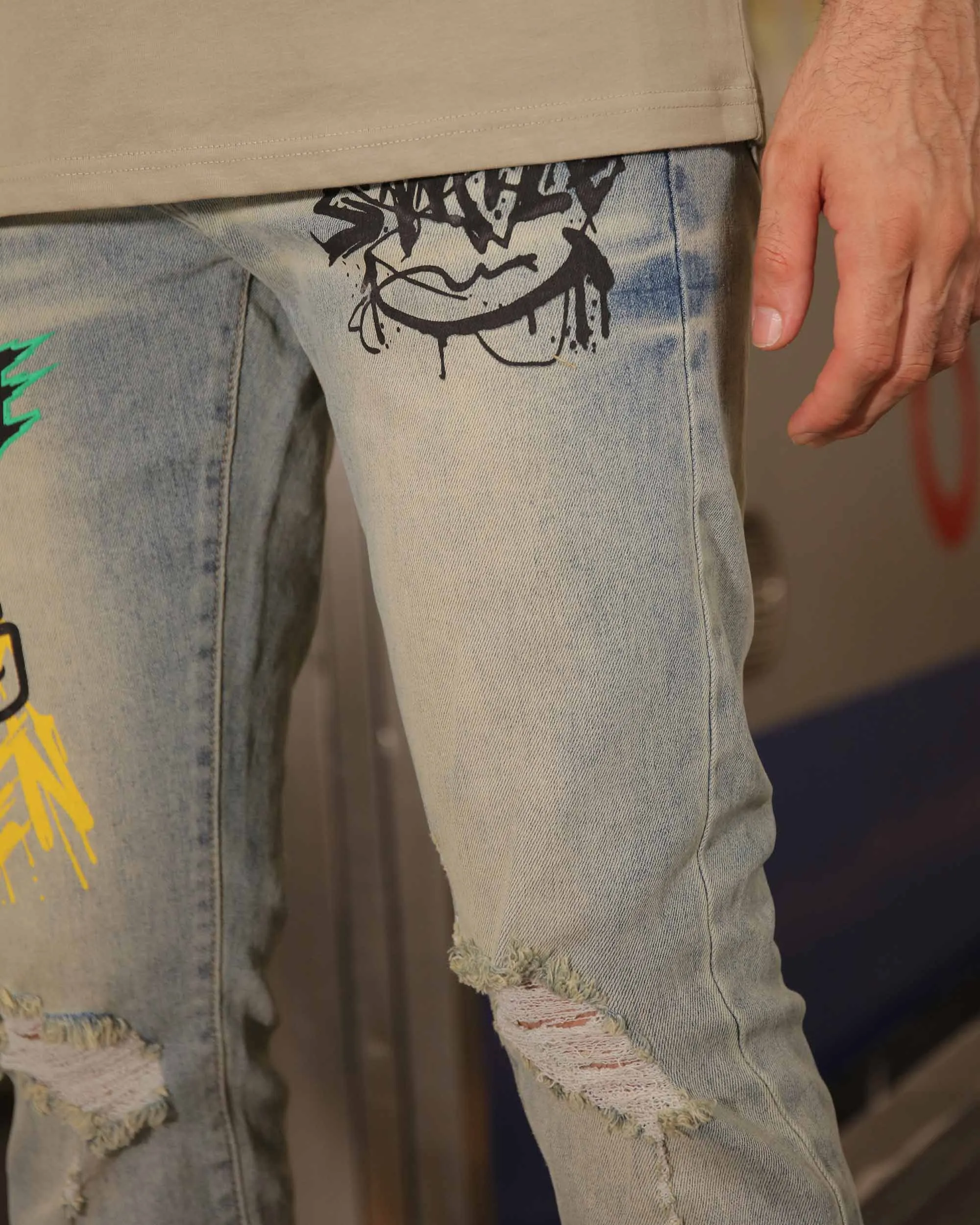 Distressed Blue Jeans with Graffiti - Streetwear Style