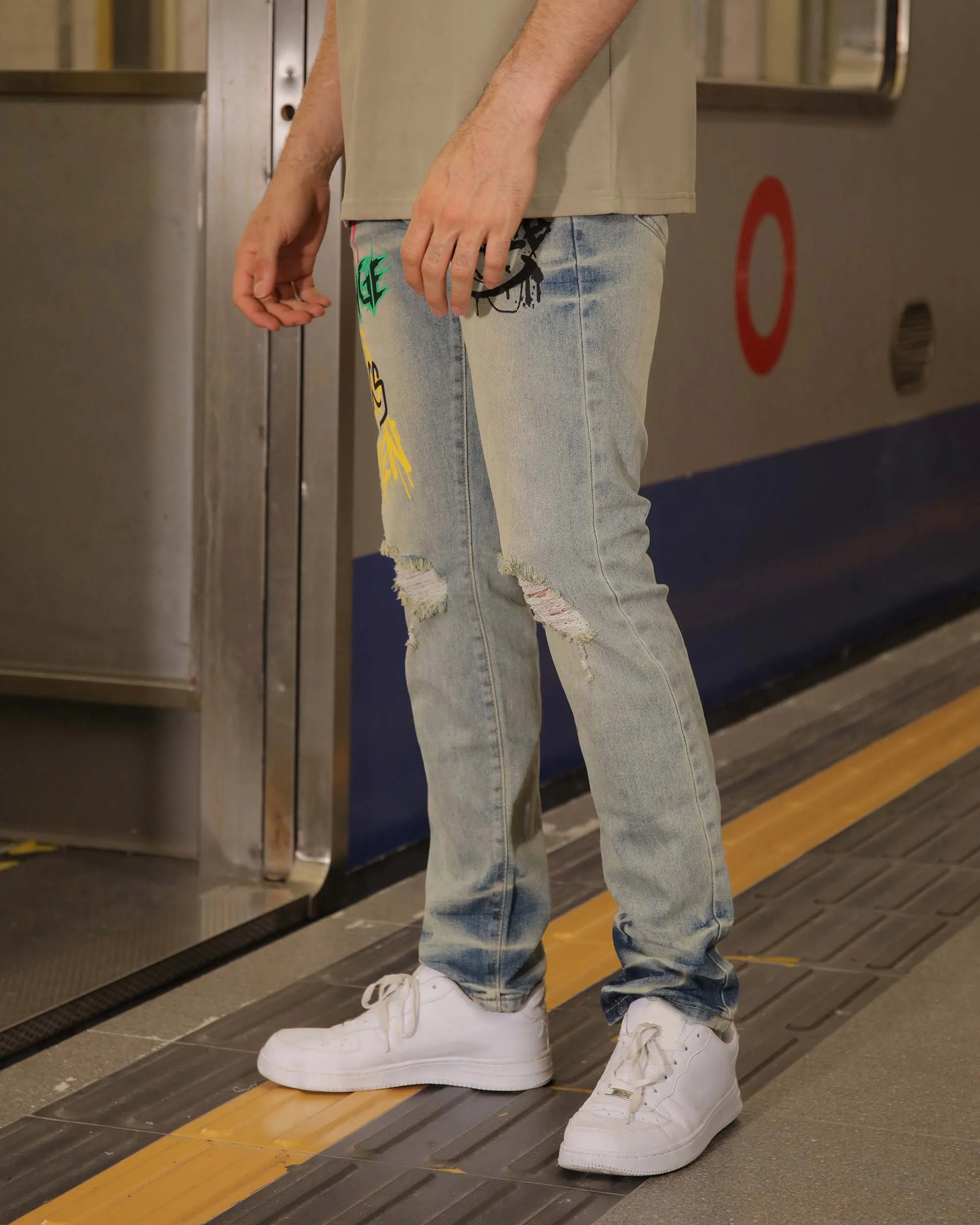 Distressed Blue Jeans with Graffiti - Streetwear Style