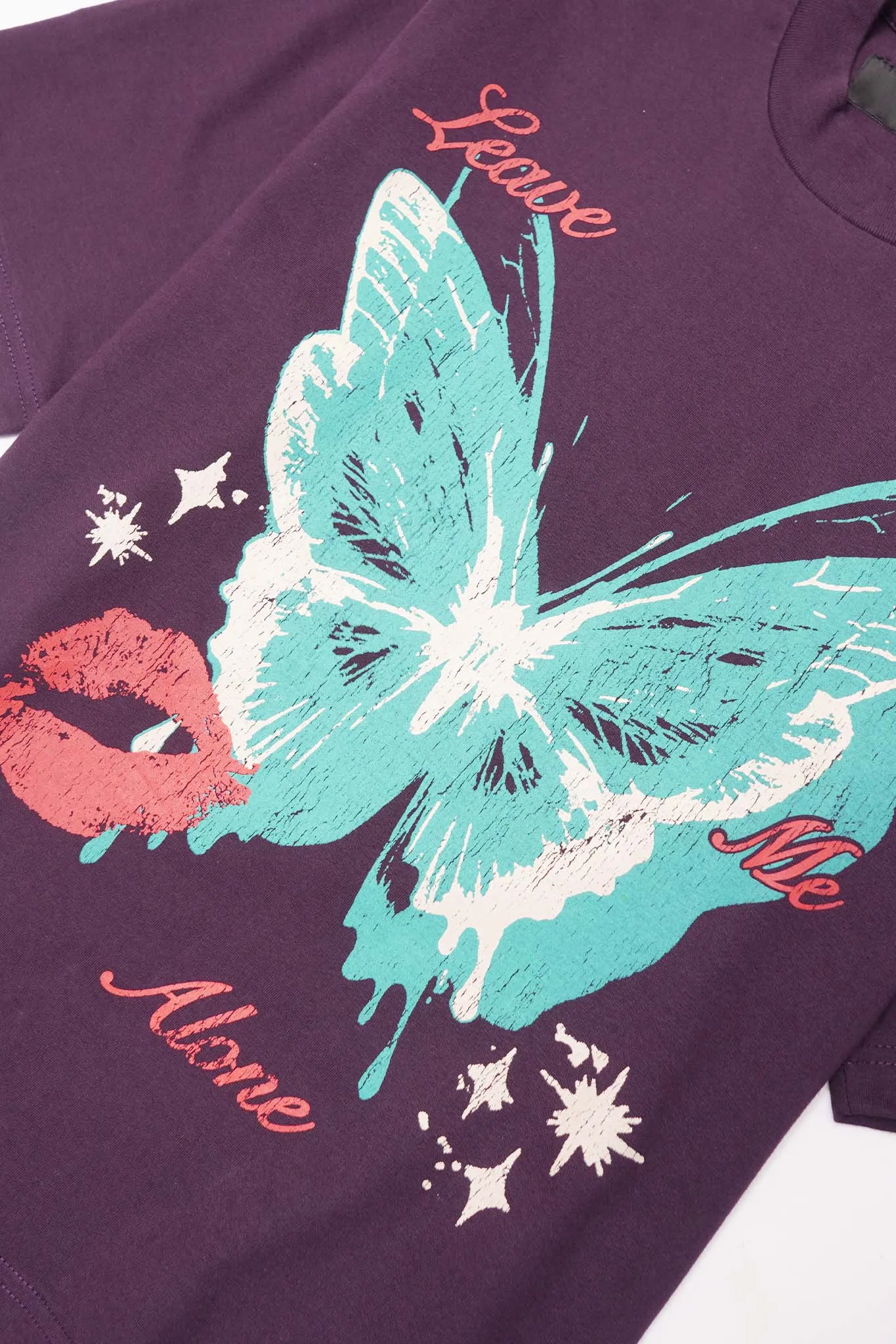 "LEAVE ME ALONE" TEE IN SHADOW PURPLE