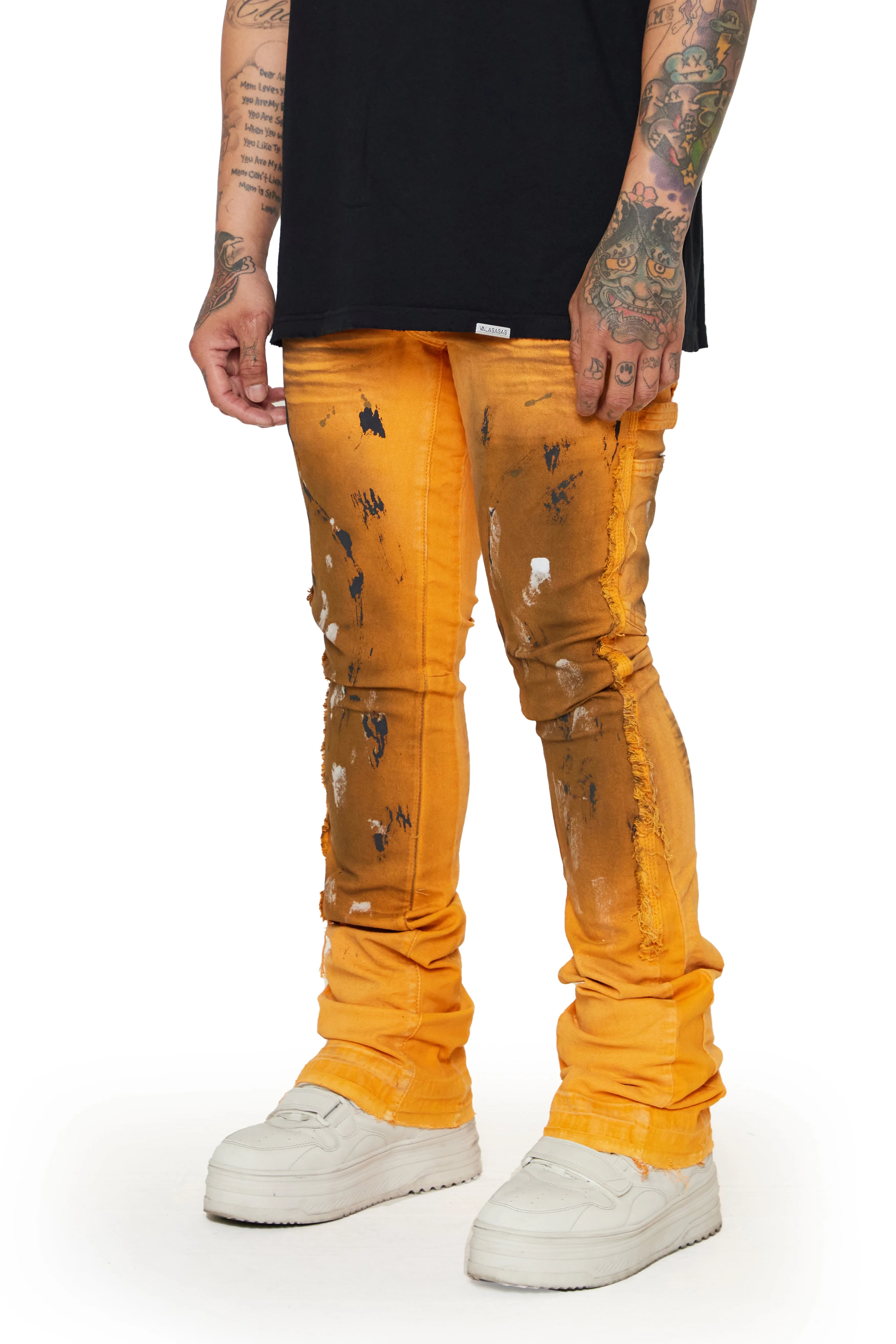 “TENACITY" ORANGE STACKED FLARE JEAN